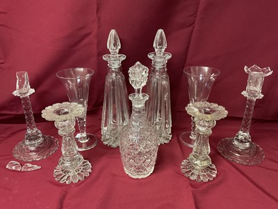 Lot 158 - Group of Regency and other 19th century glassware, including two pairs of candlesticks, a large pair of decanters of tapering form, a large pair of facet cut goblets with folded feet, and anothe...