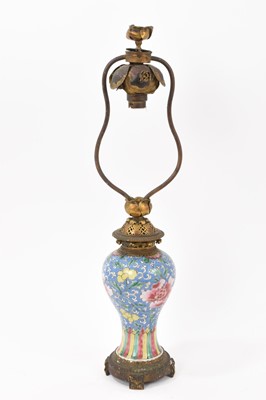 Lot 187 - 18th/19th century Chinese porcelain vase, polychrome painted with flowers, mounted in ormolu as a table lamp, 49cm total height