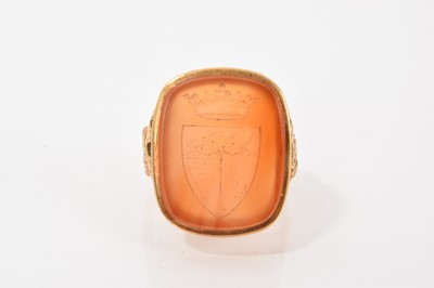 Lot 655 - Antique gold signet ring, the carnelian seal with an intaglio carved crest, in gold mount, ring size approximately N.
