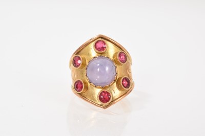 Lot 657 - Gold and gem-set 'bishop' ring with a cabochon star sapphire and red stones in gold setting, ring size P.