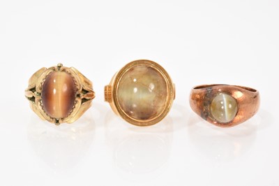 Lot 661 - Three gold signet rings with cabochon stones