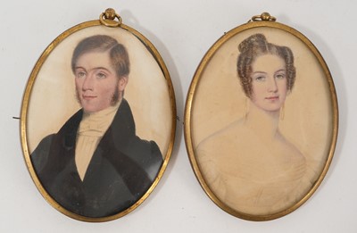 Lot 987 - Mid 19th century English School, pair of portrait miniatures on paper