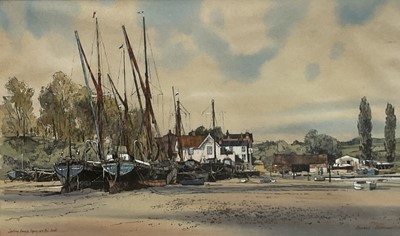 Lot 1275 - Michael Norman (b.1943) ink and watercolour - 'Sailing barges lying at Pin Mill', signed, dated 1986 and inscribed, 27cm x 45cm, in glazed frame