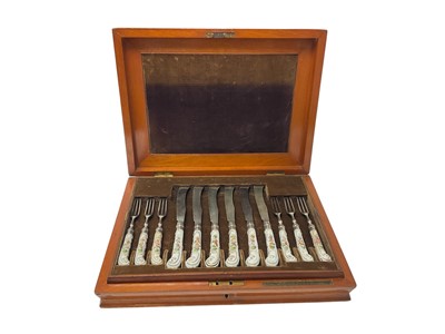 Lot 425 - Set of Georgian/Victorian cutlery in fitted case, with Chinese and English porcelain handles