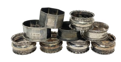 Lot 94 - Group of nine Edwardian and later silver napkin rings, (various dates and makers), all at 5.4ozs.