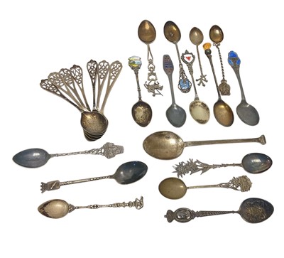 Lot 99 - Group of twenty three various silver and white metal tea spoons, various dates and makers, 9ozs.