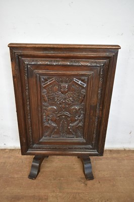 Lot 1525 - Carved oak fire screen, utilizing 17th century elements, total height 80cm