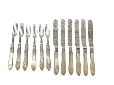 Lot 422 - Set of twelve Victorian silver and mother of pearl fruit knives and forks with engraved decoration