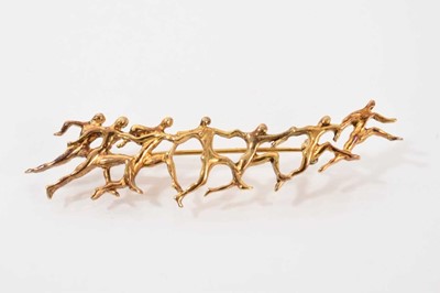 Lot 1119 - Ilias Lalaounis silver gilt Olympic brooch depicting a line of abstract running figures, 9cm