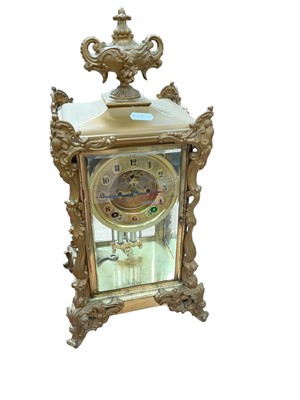 Lot 451 - Edwardian Ansonia patent four glass mantel clock in gilt metal case, 41cm in overall height.