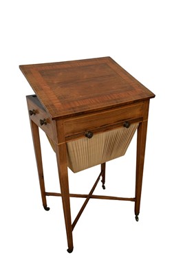 Lot 1454 - Regency rosewood and satinwood crossbanded sewing table