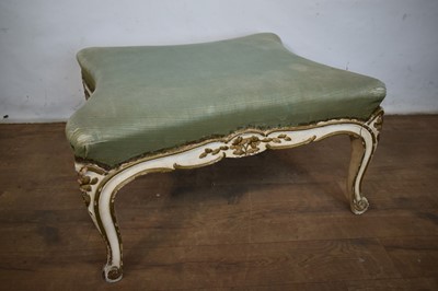 Lot 1205 - 1920s shaped footstool with gilt and cream painted frame