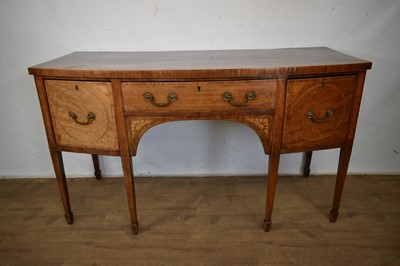 Lot 1232 - George III mahogany bowfront sideboard on square taper legs and spade feet