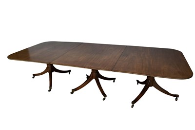 Lot 1464 - George III mahogany three pedestal dining table with two additional leaves