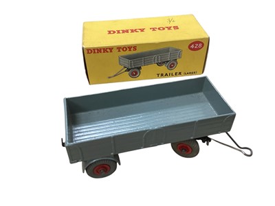 Lot 1560 - Dinky Toys Trailer (large) No.423, Harvest Trailer No.320 & Dinky Supertoys Lawn Mower (handle broken) No.751, all boxed (3)