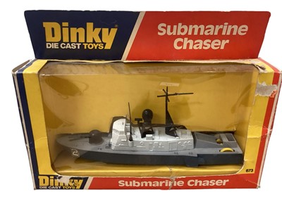 Lot 1558 - Dinky Toys Submarine Chaser, in window box No.673 & Motor Patrol Boat, on plinth (missing bubble cover) No.675 (2)