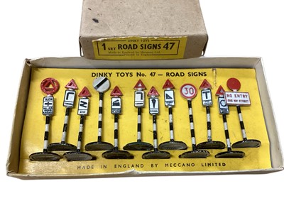 Lot 1539 - Dinky Toys Road Signs No.47, International Road Signs No.771 & Panneaux de Signalisation Routiere (French Road Signs) No.593, all boxed (3)