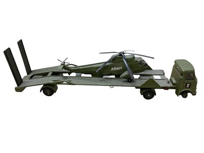 Lot 1557 - Dinky Toys AEC Artic Transporter with Helicopter, boxed (poor) No.618 & Military Vehicles Gift Set (Austin Champ missing), reproduction box No.699 and Medium Artillery Tractor, reproduction...