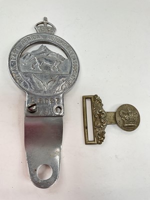 Lot 372 - East African RAC badge and military buckle part