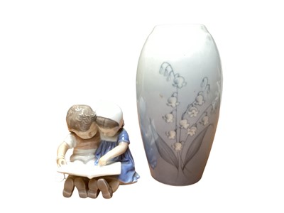 Lot 774 - Bing & Grondahl model of children reading, no. 1567, together with a vase, no. 5251 (2)