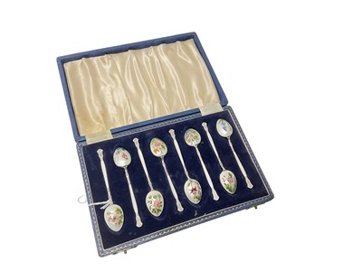 Lot 145 - Set of eight 1950's silver and enamel coffee spoons, each with hand painted floral decoration, in a fitted case, (Birmingham 1958), maker Henry Clifford Davis. All at 2.9ozs