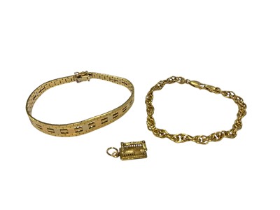 Lot 86 - Two 18ct gold bracelets and 18ct gold charm (all stamped 750)