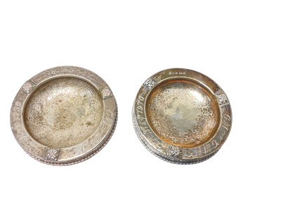 Lot 105 - Pair of George V Arts & Crafts silver pin dishes of circular form with planished decoration and rope twist borders, each with engraved inscriptions, (Birmingham 1926), maker A. E. Jones, eac...
