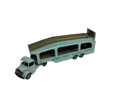 Lot 1825 - Dinky Toys Pullmore Car Transporter No.582 with loading ramp No.994 & Fire Engine with extending ladder No.555, all boxed (worn) (3)