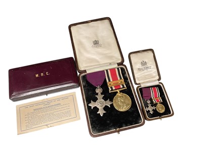 Lot 721 - Police medal pair comprising M.B.E, hallmarked London 1919 and George V Special Constabulary Long Service medal with two clasps