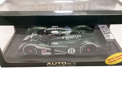 Lot 1836 - Auto Art 1:18 scale Bentley Speed 8, Jaguar XK-SS & Aston Martin DB5, in window boxes (3)