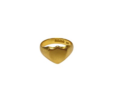 Lot 152 - 18ct gold signet ring with a sheid shaped panel (Birmingham 1917), size T
