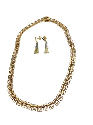 Lot 201 - Yellow metal Greek Key design necklace (marked 585) and a pair of yellow and white metal earrings