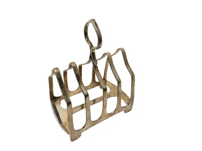 Lot 223 - George V silver four division toast rack, (Sheffield 1919), maker James Dixon & Sons, 8cm in length, all at approximately 2.5ozs.