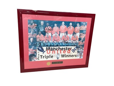 Lot 2482 - Framed Manchester United 1999 treble winners' poster signed by the team