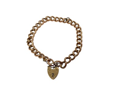 Lot 260 - 9ct rose gold curb link chain bracelet with 9ct yellow gold padlock clasp