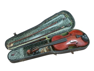 Lot 2223 - Three quarter size student violin, with two piece back, cased together with two bows