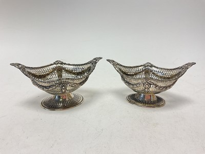 Lot 1051 - Pair of Victorian silver pedestal bonbon dishes of navette form with swag and pierced decoration
