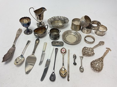 Lot 1056 - Group of silver to include napkin rings, chew jug, egg cup, dishes etc together with some plated flatware etc