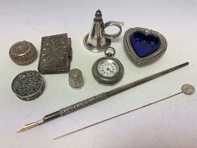 Lot 1060 - Group of silver and white metal to include a silver dip pen, silver heart shaped salt with blue glass liner, silver cased fob watch, filigree items etc