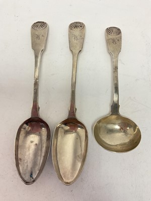 Lot 252 - Two George III silver fiddle and shell pattern table spoons, and a matching sauce ladle (London 1817, 1820 & 1821), maker William Eley & William Fearn, all at approximately 8ozs.