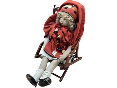 Lot 1803 - Large Lenci felt doll, moulded and painted facial features, curly blonde hair, zigzag stitching to back of head...