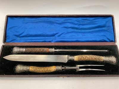 Lot 368 - Sheffield steel and stag antler carving set with plated mounts in fitted case