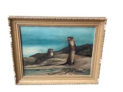 Lot 853 - Oil on canvas of two Otters on rocky shore