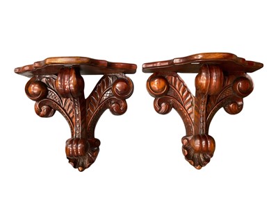 Lot 289 - Pair of 19th century style carved mahogany wall brackets