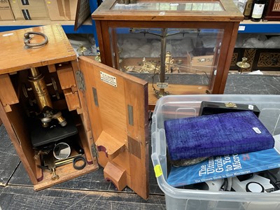 Lot 149 - Two microscopes, a chemist's balance scales and an aneroid barometer in serpentine frame