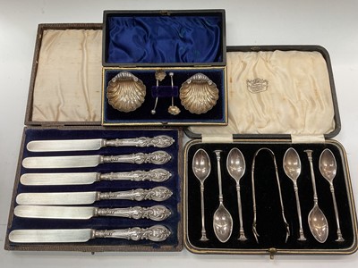 Lot 1088 - Pair of Victorian silver shell shaped salts with spoons (Birmingham 1895), set of six silver teaspoons and pair silver sugar tongs, and set of six silver handled butter knives
