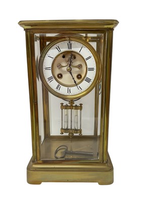 Lot 817 - French brass cased four glass mantel clock