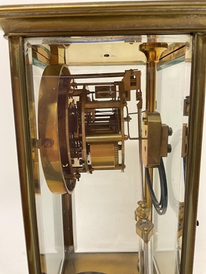 Lot 817 - French brass cased four glass mantel clock