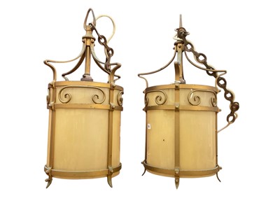 Lot 773 - Pair of vintage lanterns with gilded wrought metal frames of cylindrical form, originally from St. Michael's Convent, Clacton-On-Sea