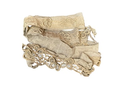 Lot 2112 - Box of antique lace including 320cms approximately handmade needlepoint lace trim, shamrocks with heavy raised edges and infills, supported on linen strip